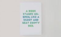 A book stands un-open, like a silent and neat empty bed