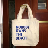 NOBODY OWNS THE BEACH (tote bag)