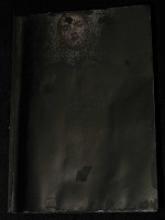 small blackened book 1